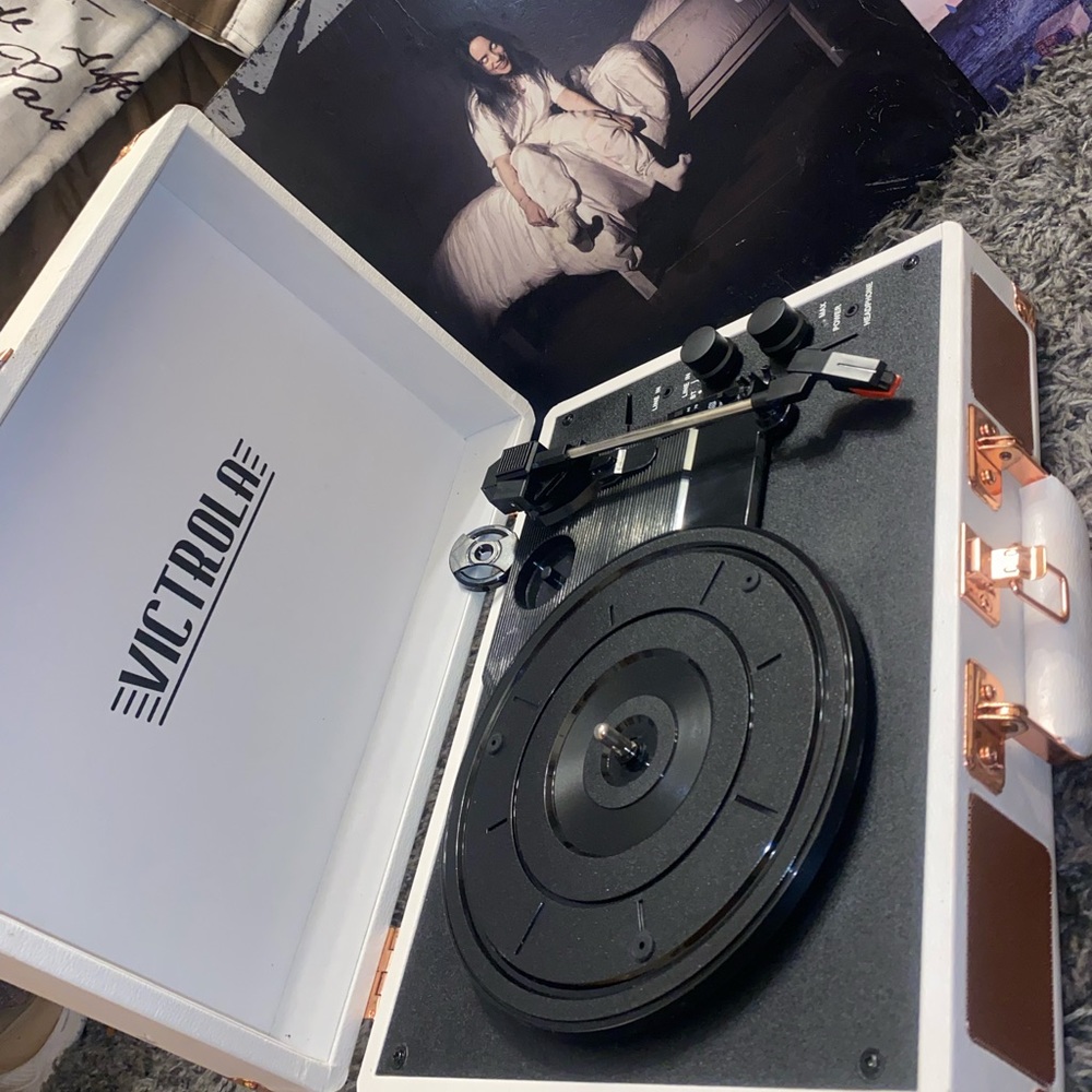 Record player comes with additional 2 records